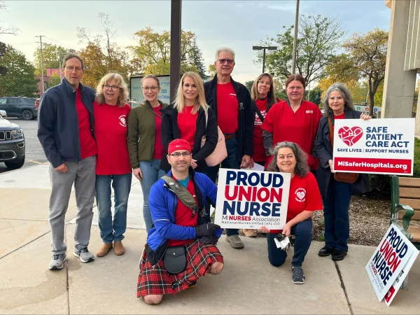 Group of nurses outside with "